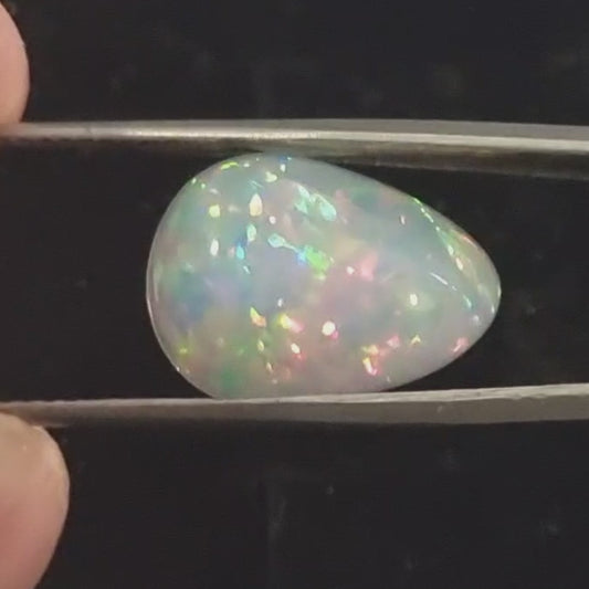 White Opal special Ethiopian Welo, 7.85 ct pear polished, natural, intense Play-of-Colour