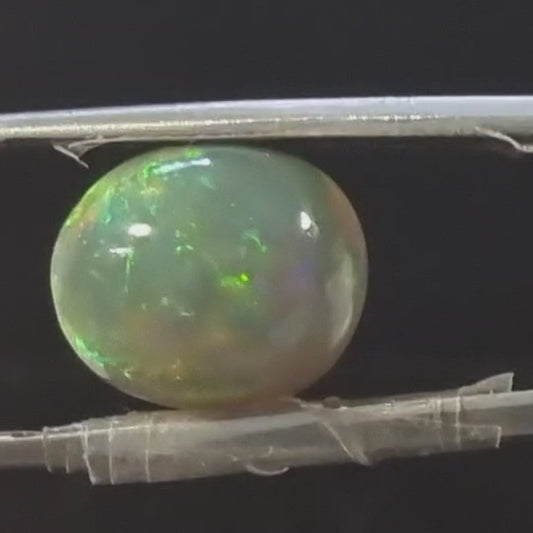 Black Opal special Ethiopian Welo, 7.65 ct oval polished, natural, intense Play-of-Colour